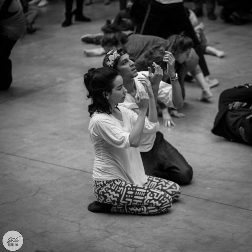 Participants in a guided movement practice